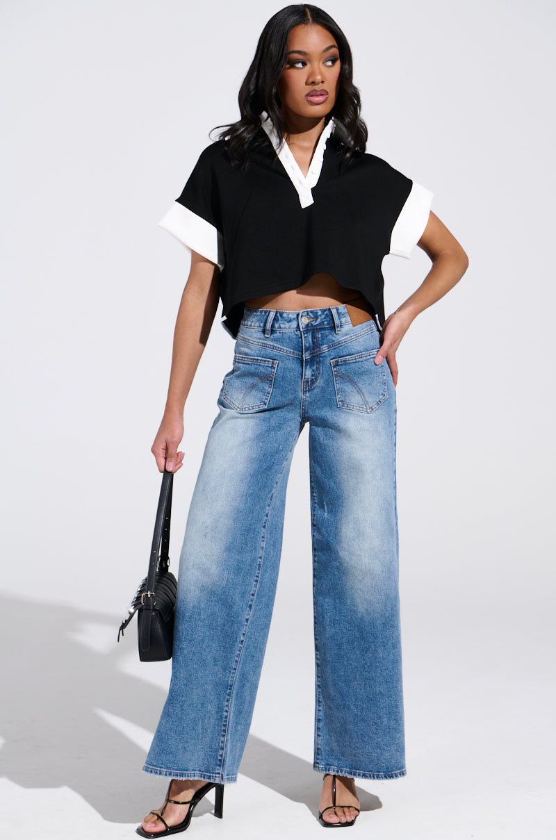 REVERSE REVERSE MEDIUM WASH JEANS