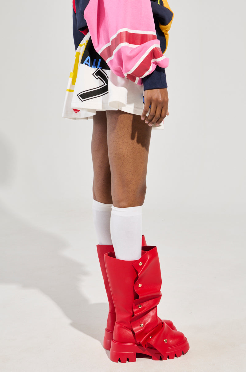WE ARE INFINITE PLEATED MINI SKIRT