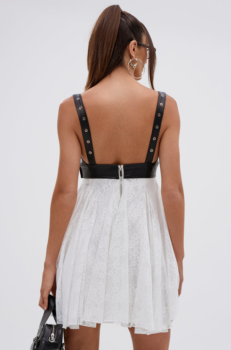 EDGY WITH A BOW ON TOP MINI DRESS